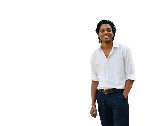 Amit Bhowmik smiling, wearing a formal shirt, standing in front of a blurred office background. The mood is confident and welcoming.